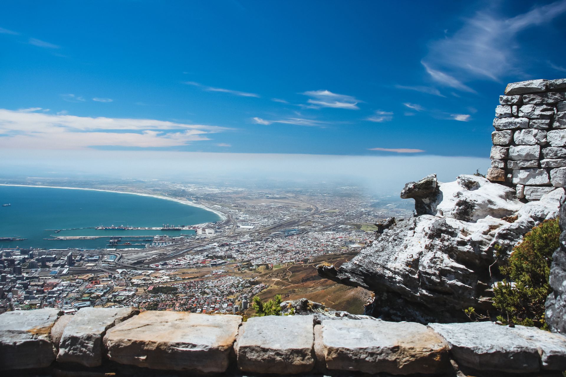 The view from Table Mountain across Cape Town, the bay and the coastline.